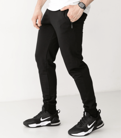 Спортивные штаны на манжетах, карманы на молнии