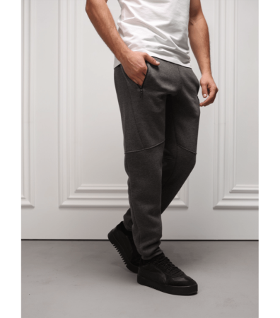 Теплі спортивні штани різані з карманами на застібках