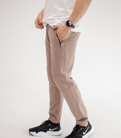 Спортивные штаны на манжетах, карманы на молнии