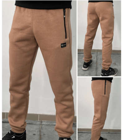 Теплі спортивні штани на манжетах